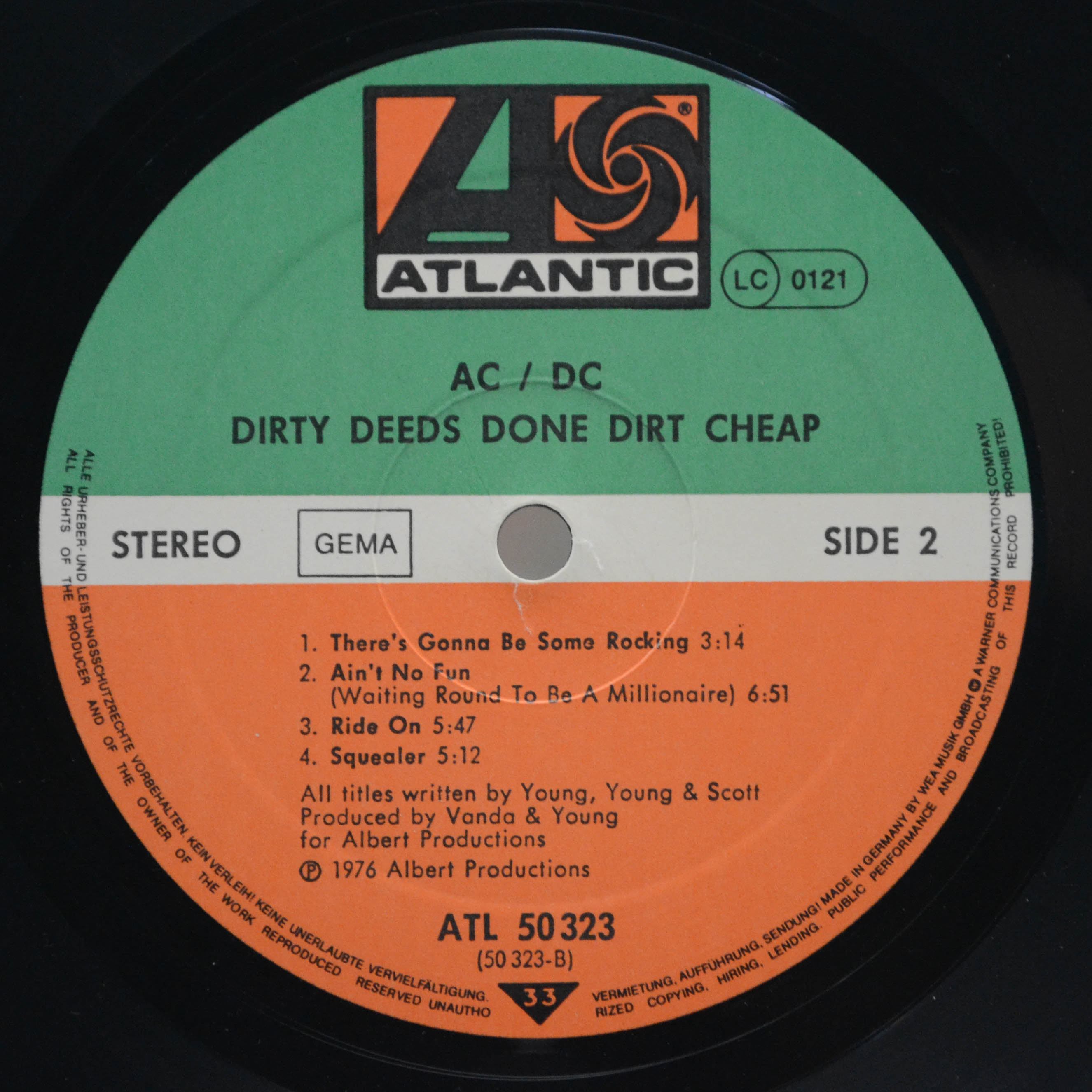 AC/DC — Dirty Deeds Done Dirt Cheap, 1976