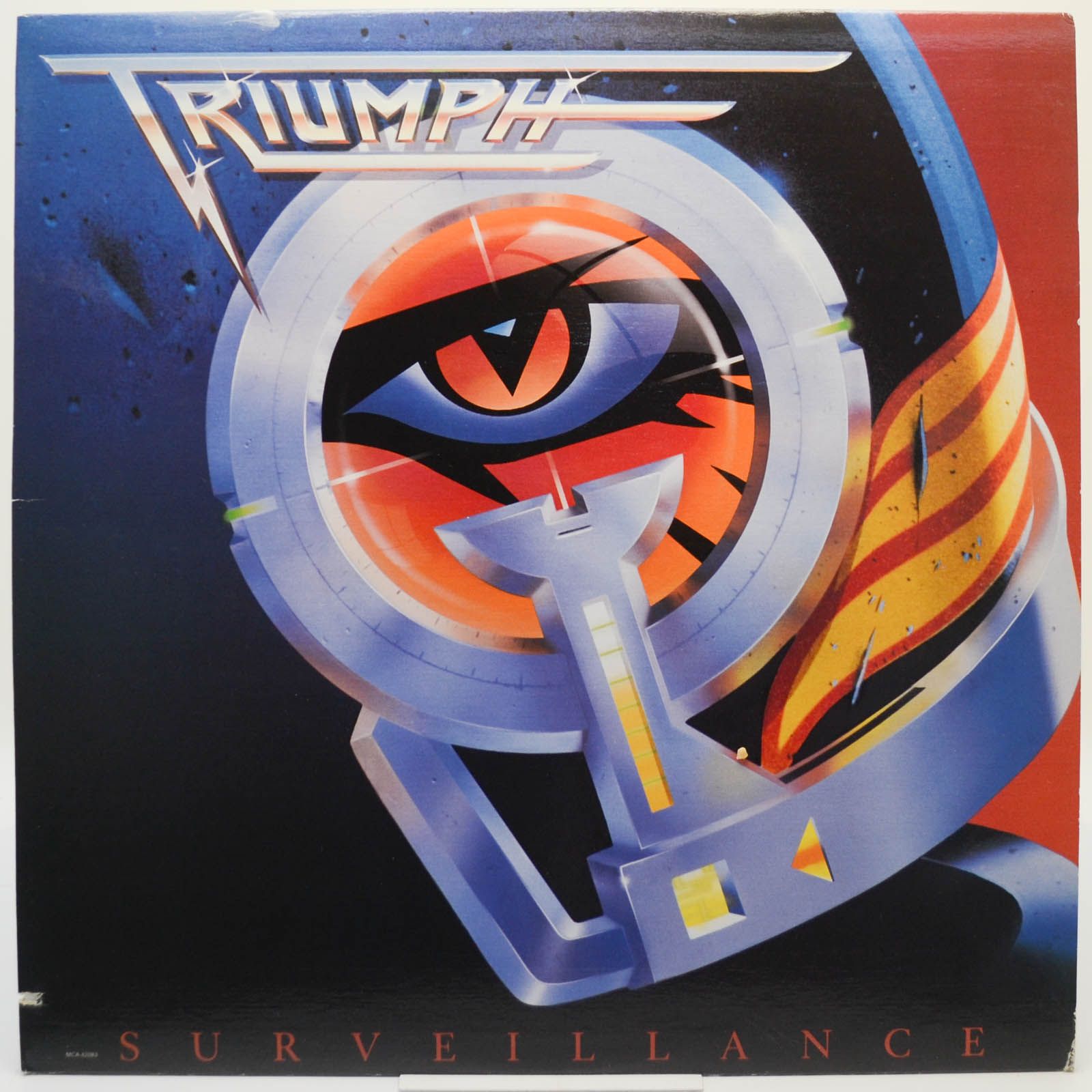Triumph — Surveillance (1-st, Canada), 1987