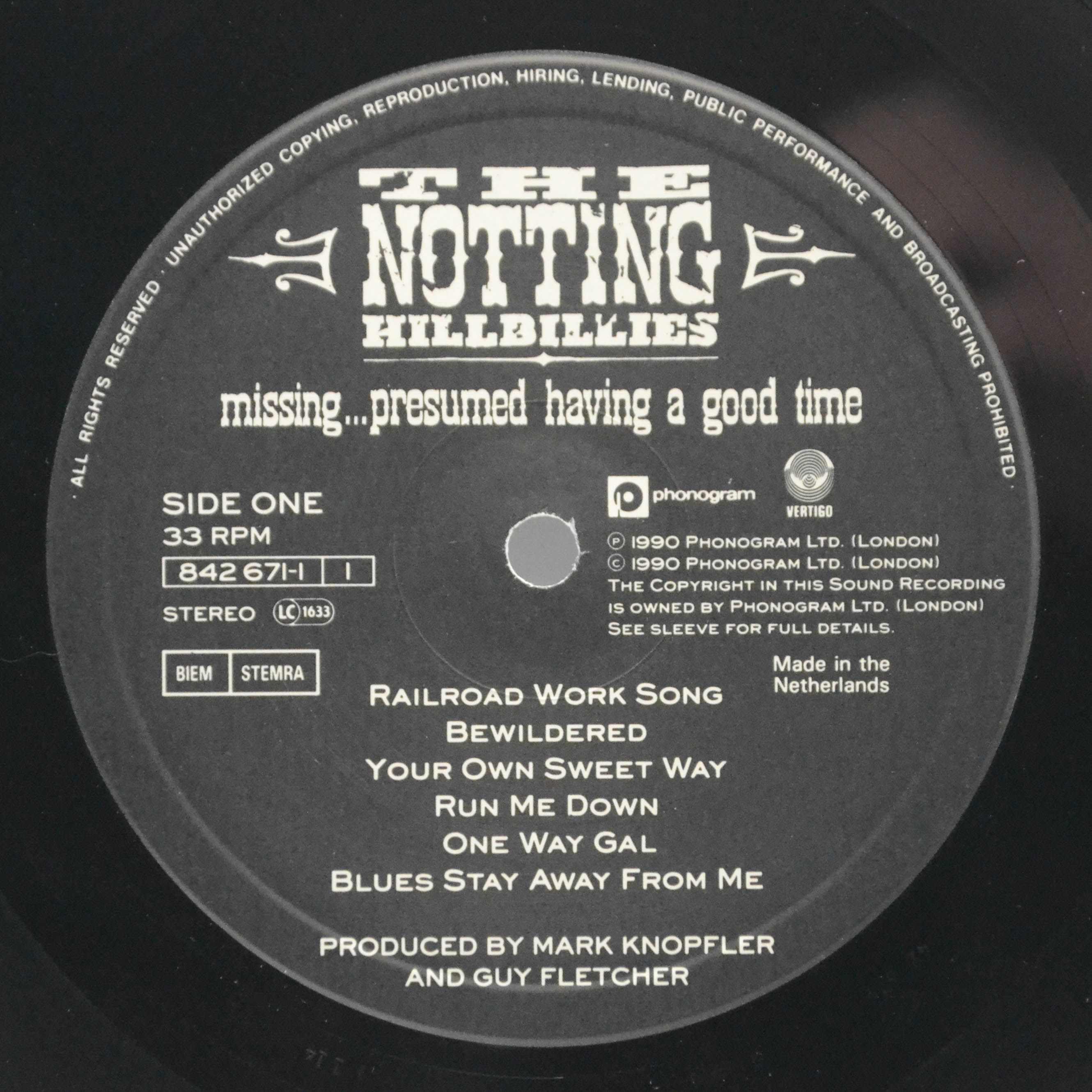 Виниловая пластинка Notting Hillbillies — Missing...Presumed Having A Good Time, 1990