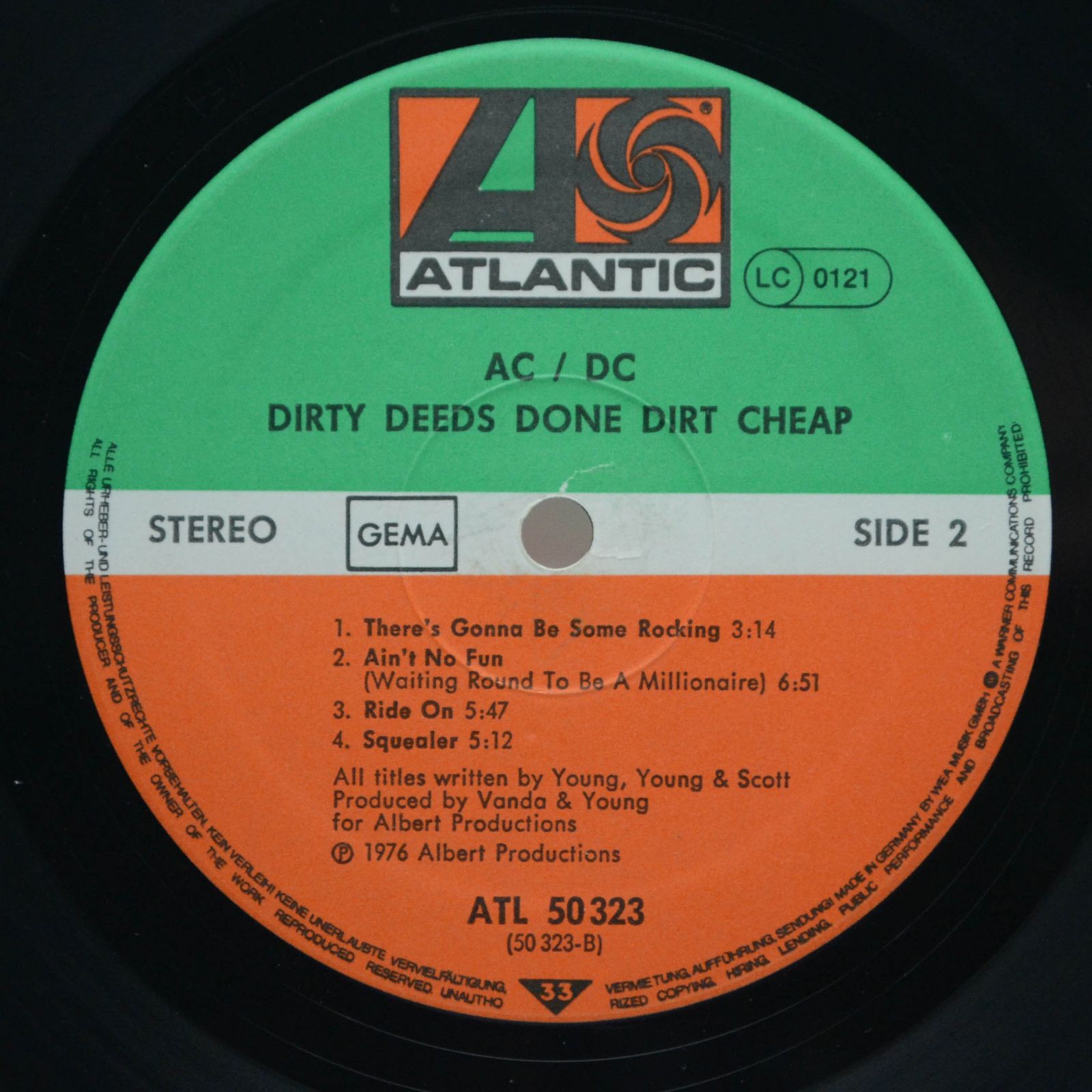 AC/DC — Dirty Deeds Done Dirt Cheap, 1976
