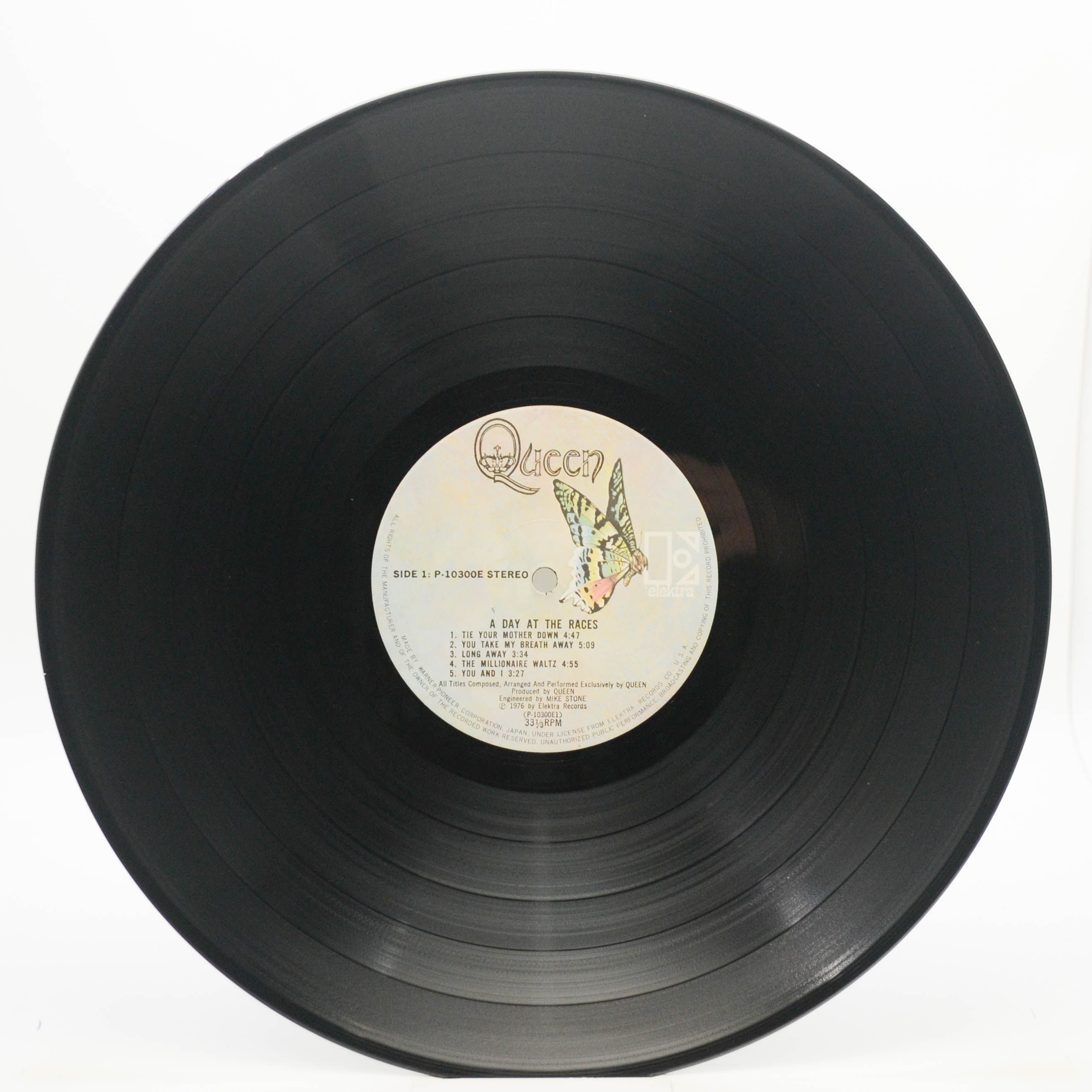 Queen — A Day At The Races, 1976