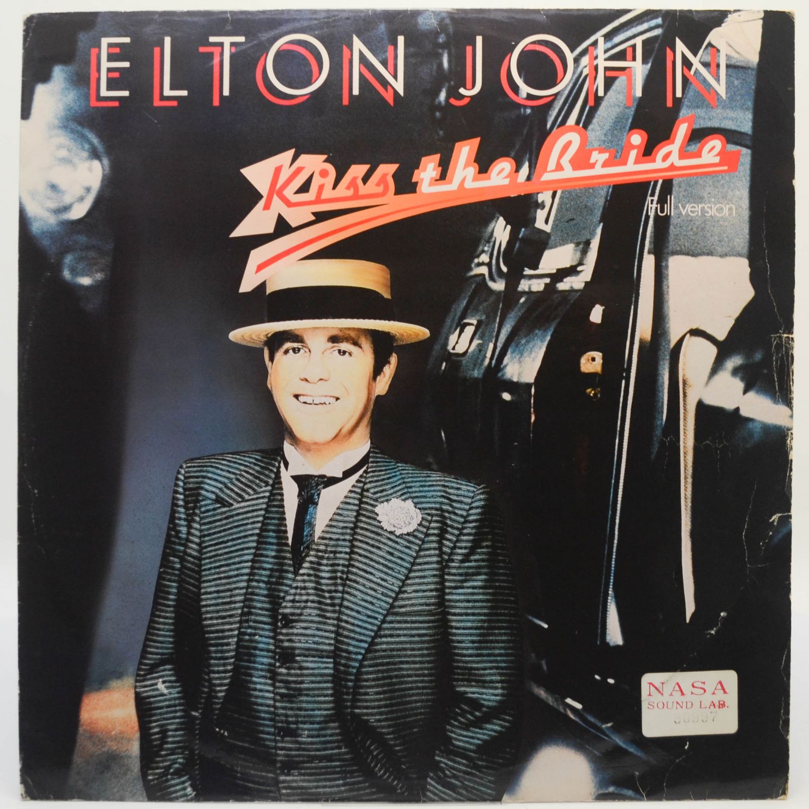 Elton John — Kiss The Bridge, 1983