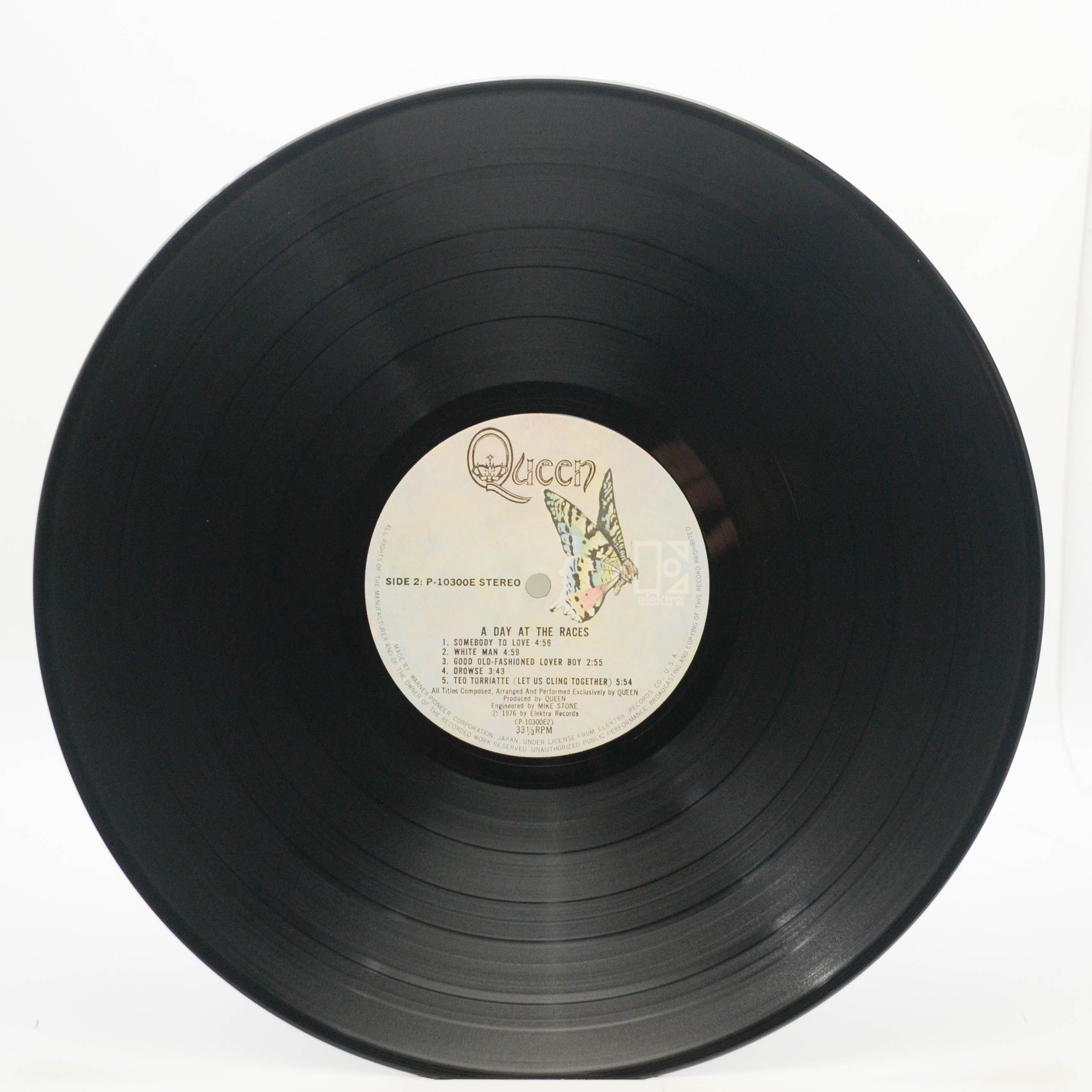Queen — A Day At The Races, 1976