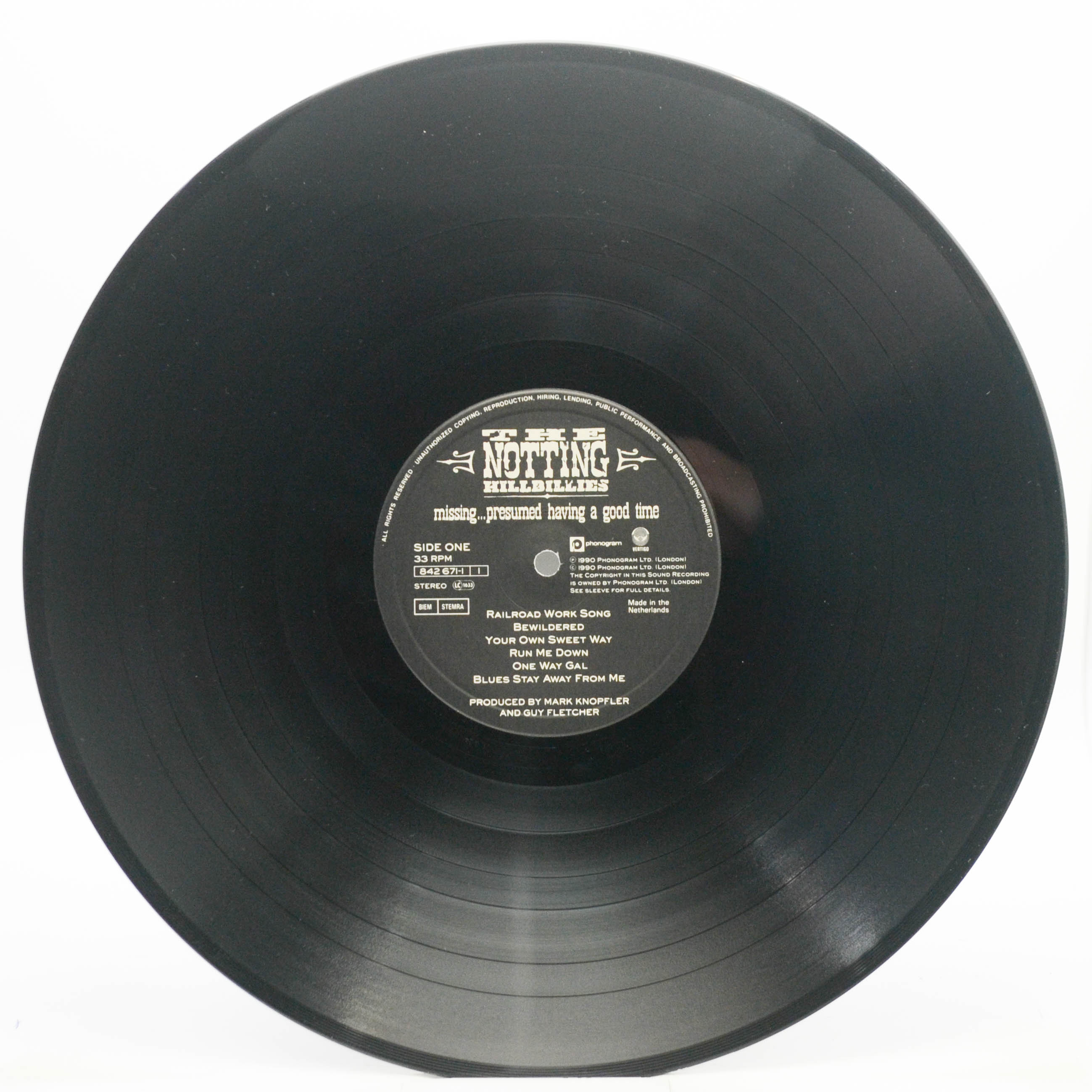 Виниловая пластинка Notting Hillbillies — Missing...Presumed Having A Good Time, 1990