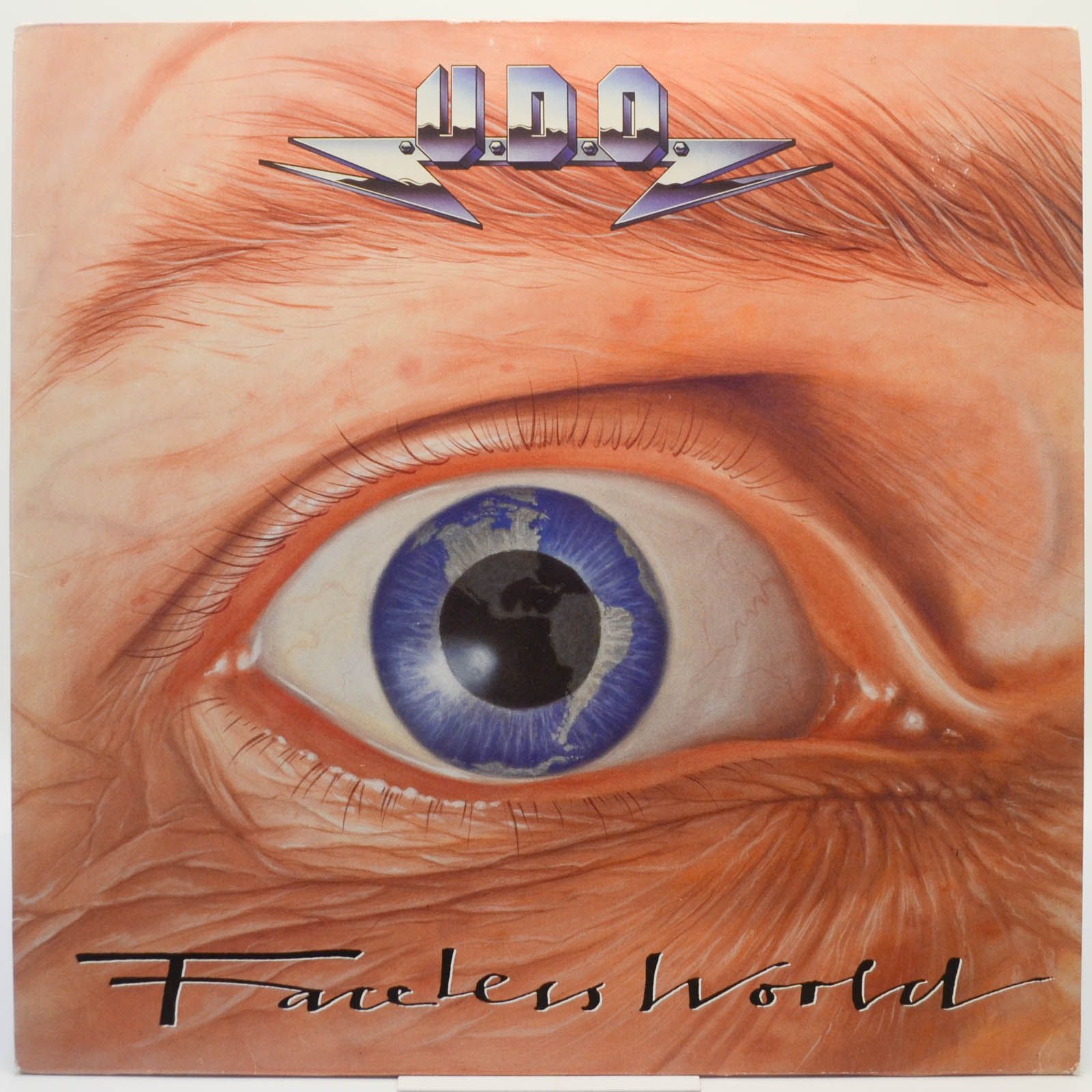U.D.O. — Faceless World (1-st, Germany), 1990