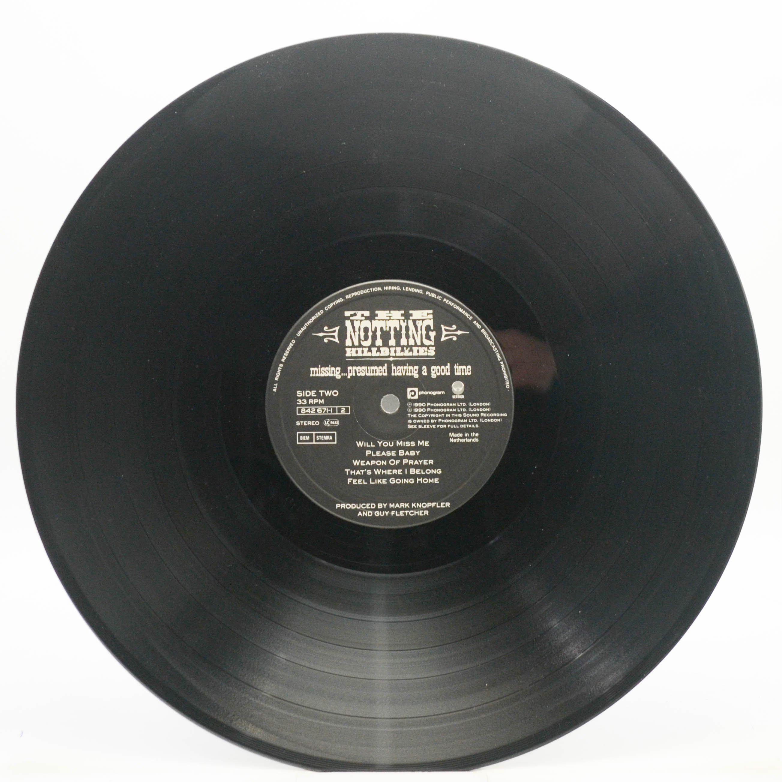 Виниловая пластинка Notting Hillbillies — Missing...Presumed Having A Good Time, 1990